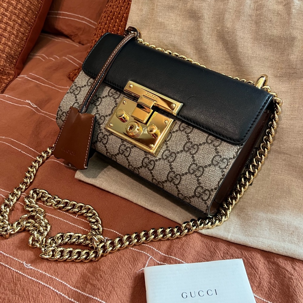 Beautiful authentic, black&brown leather, some minor scratches on gold hardware
